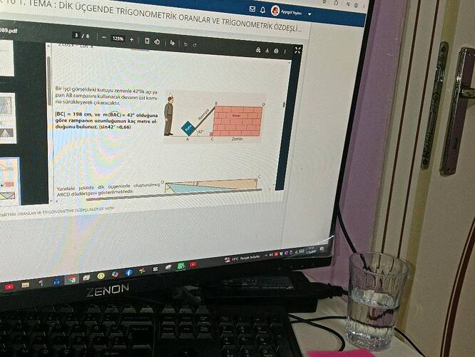 Bir işçi görseldeki kutuyu zeminle 42ⁱrc lik açı yapan AB rampasını kullanarak duvarın...